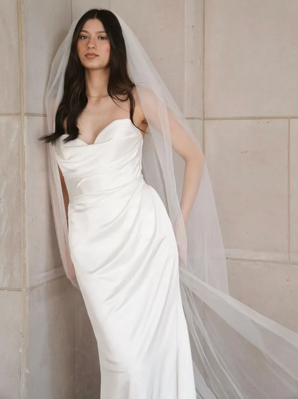 Model wearing a white gown