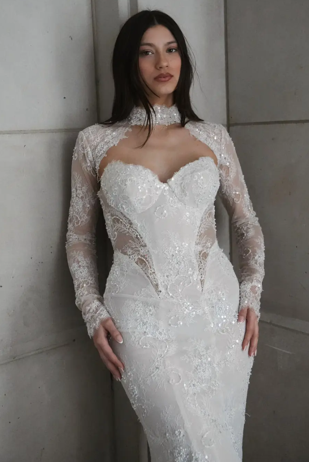 Model wearing a white gown