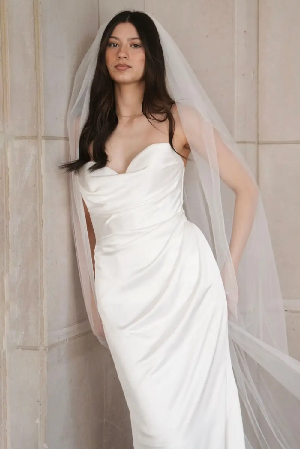 Model wearing a white gown