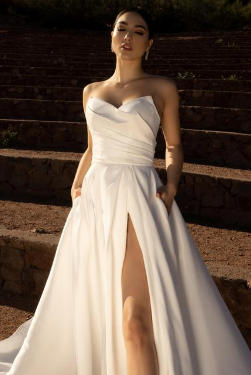 Model wearing a white gown